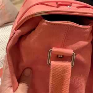 Disclosure of camera bag scuff.